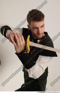 KEETA MOVING POSE WITH SWORD